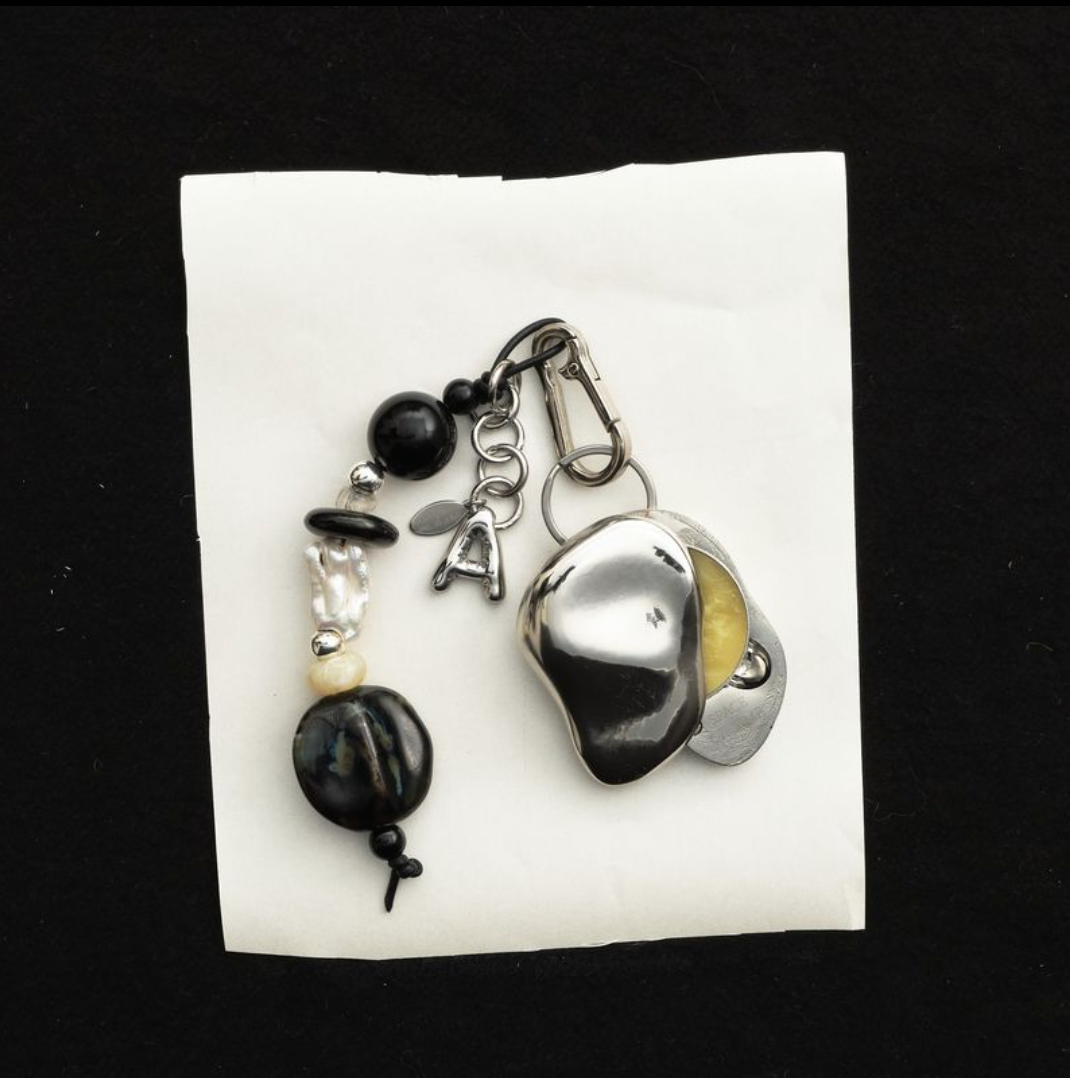 Everyday Talisman Keychain by Space of Time x Sea + Pattern: silver balm case on a handmade beaded charm keychain with letter charm