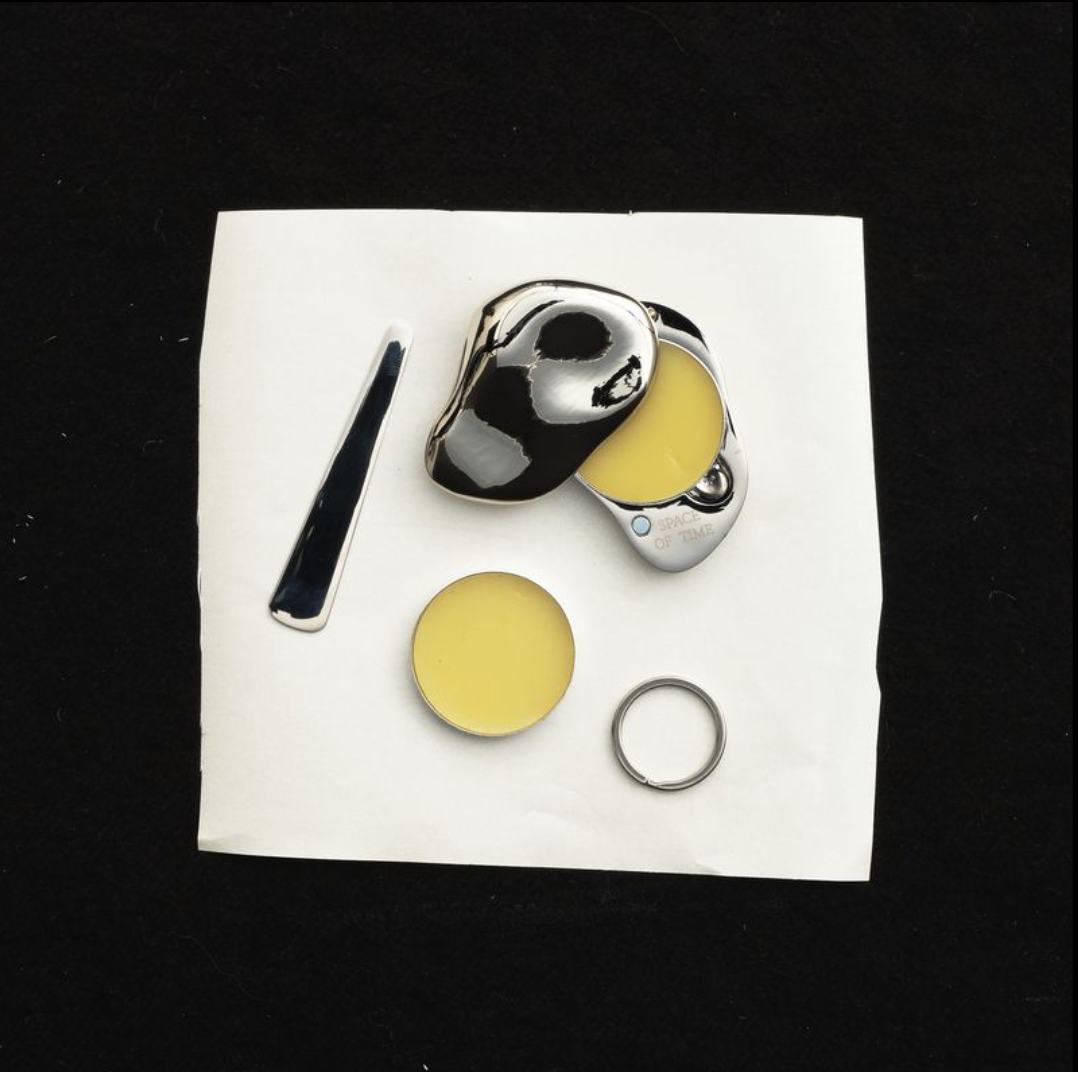 Day to Night Set by Space of Time: silver keepsake balm case with Daily Awakening and Evening Grounding balms, refill tool and keychain ring
